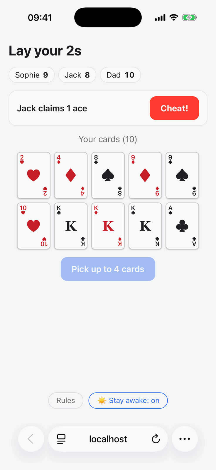 A player's phone during Cheat in Group Games, with a hand of cards and the red Cheat! challenge button