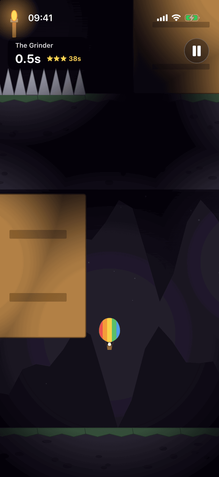 Looney Ballooney on iPhone: The Deep Dark, a lit cave with a wall torch