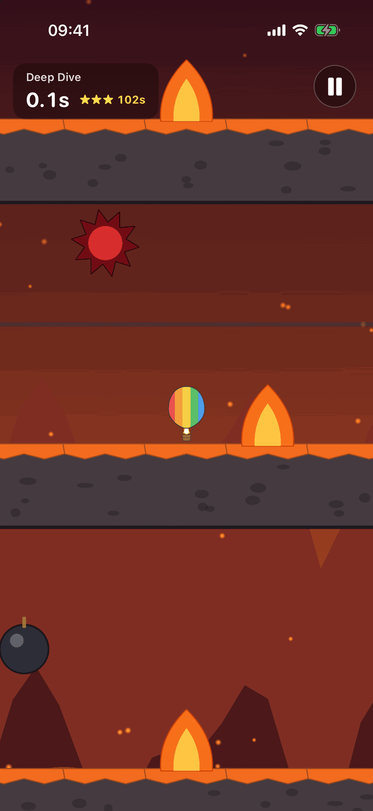 Looney Ballooney on iPhone: Magma Mountain, with flames, a spike ball and a bomb
