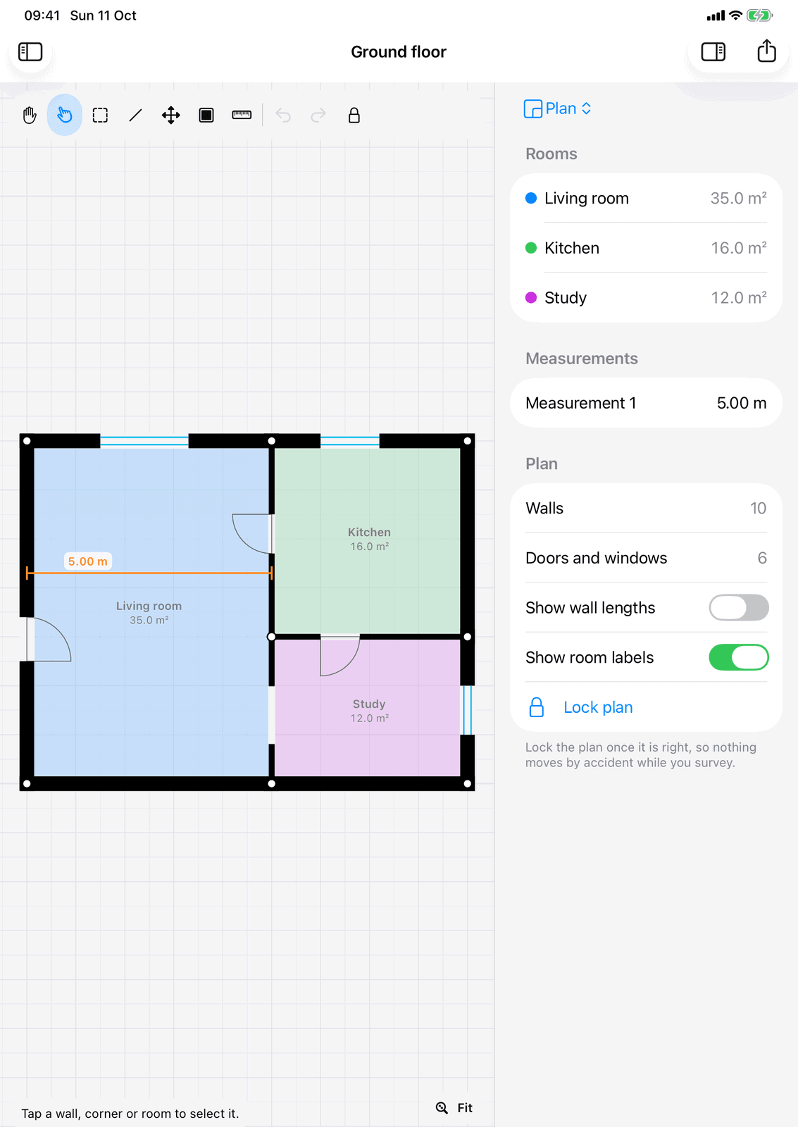 WiFi Plan on iPad: the floor plan of the sample house with the living room, kitchen and study coloured and measured
